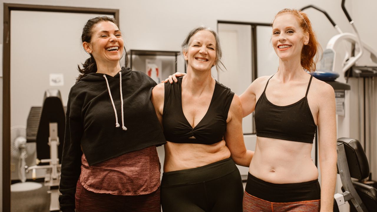 Women smiling in gym gear
